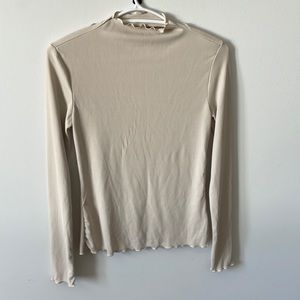Long sleeve with wavy ends